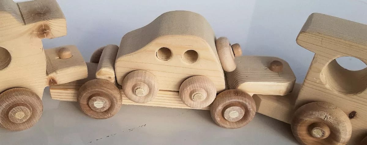 Train with Locomotive, Flat car with Bug car and Caboose - Image 3