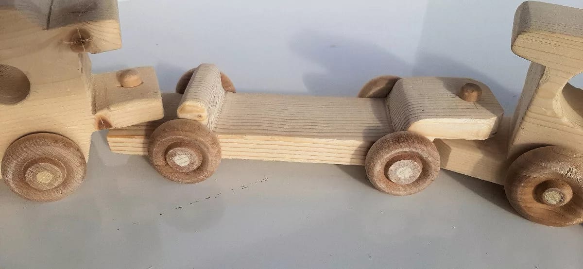 Train with Locomotive, Flat car with Bug car and Caboose - Image 5