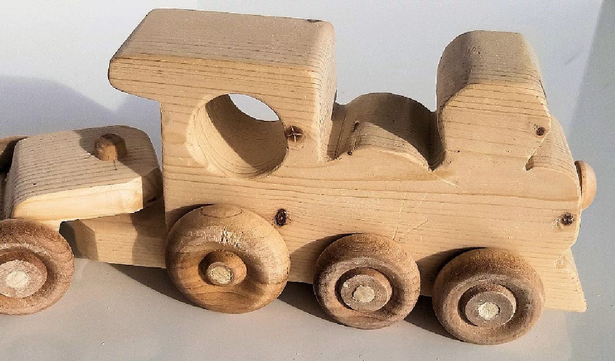 Train with Locomotive, Flat car with Bug car and Caboose - Image 6